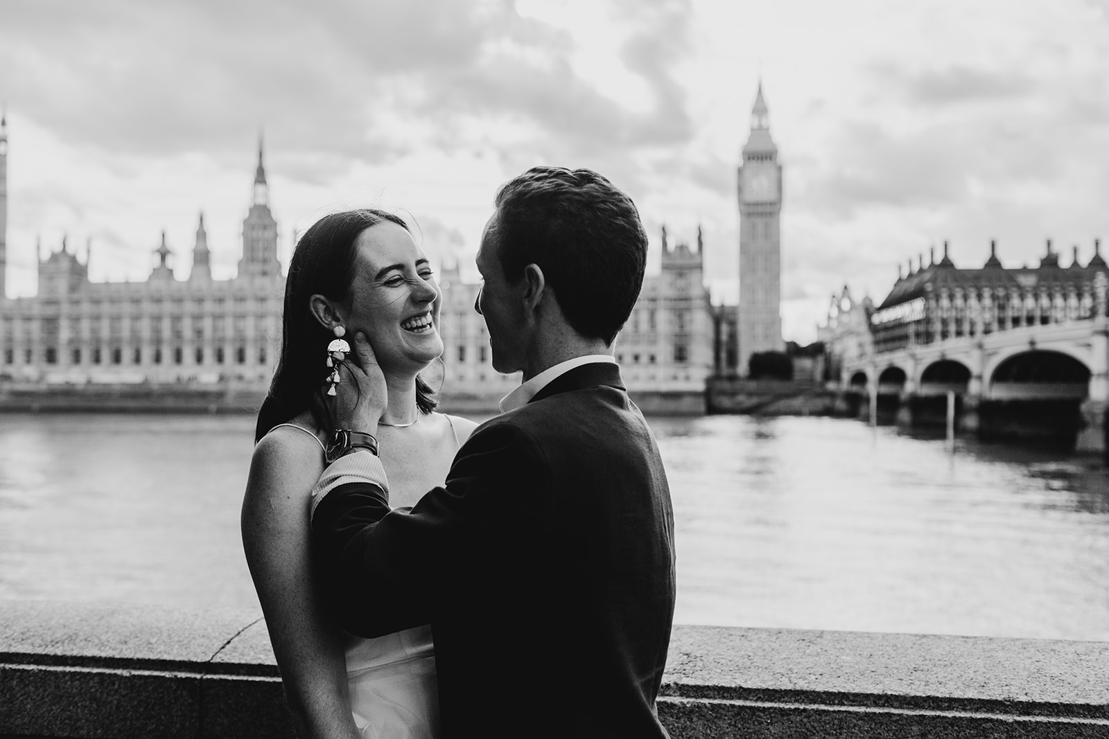 A couple in the City during their wedding in the UK capturing portraits
